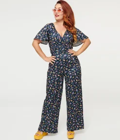 Dolly & Dotty Black Dinosaur & Rainbow Print Charlotte Jumpsuit