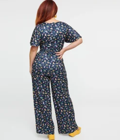 Dolly & Dotty Black Dinosaur & Rainbow Print Charlotte Jumpsuit