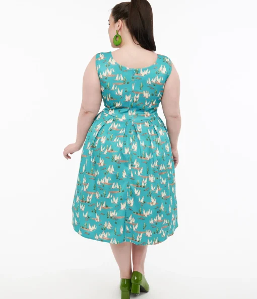 Dolly & Dotty 1950s Turquoise Meerkat Print Amanda Swing Dress