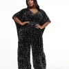 Unique Vintage Plus Size 1970s Black Iridescent Sequin Caftan Jumpsuit